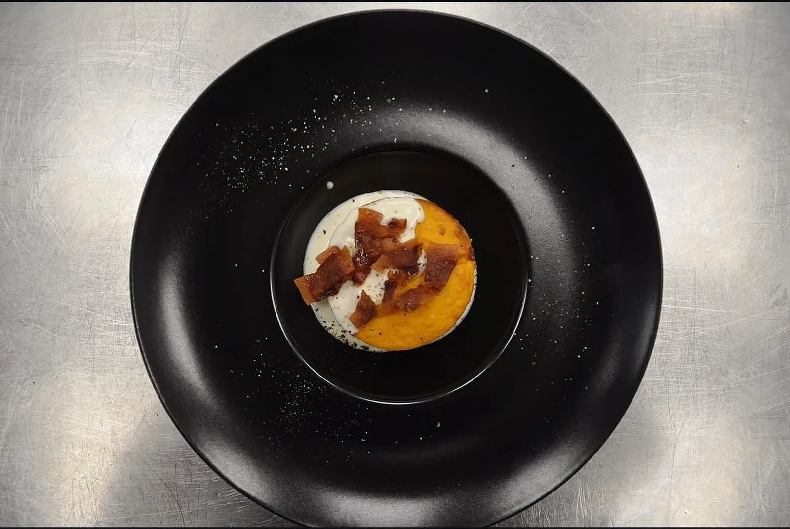Flan di zucca con guanciale croccante e fonduta di taleggio